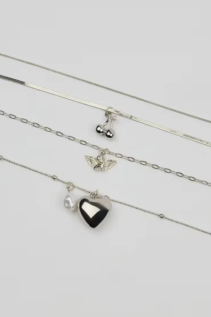 Set Of 4 Angel And Cherry Pendant Necklaces